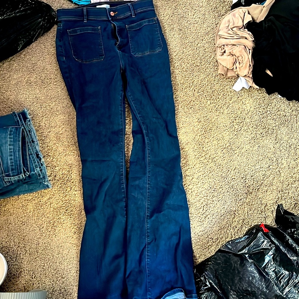 Denim dark blue flair jeans very high-rise.